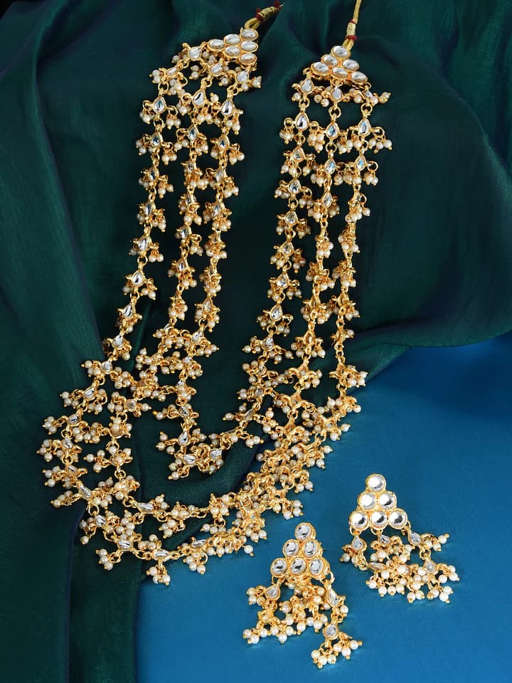 Gold Finish Kundan Necklace With White Stone