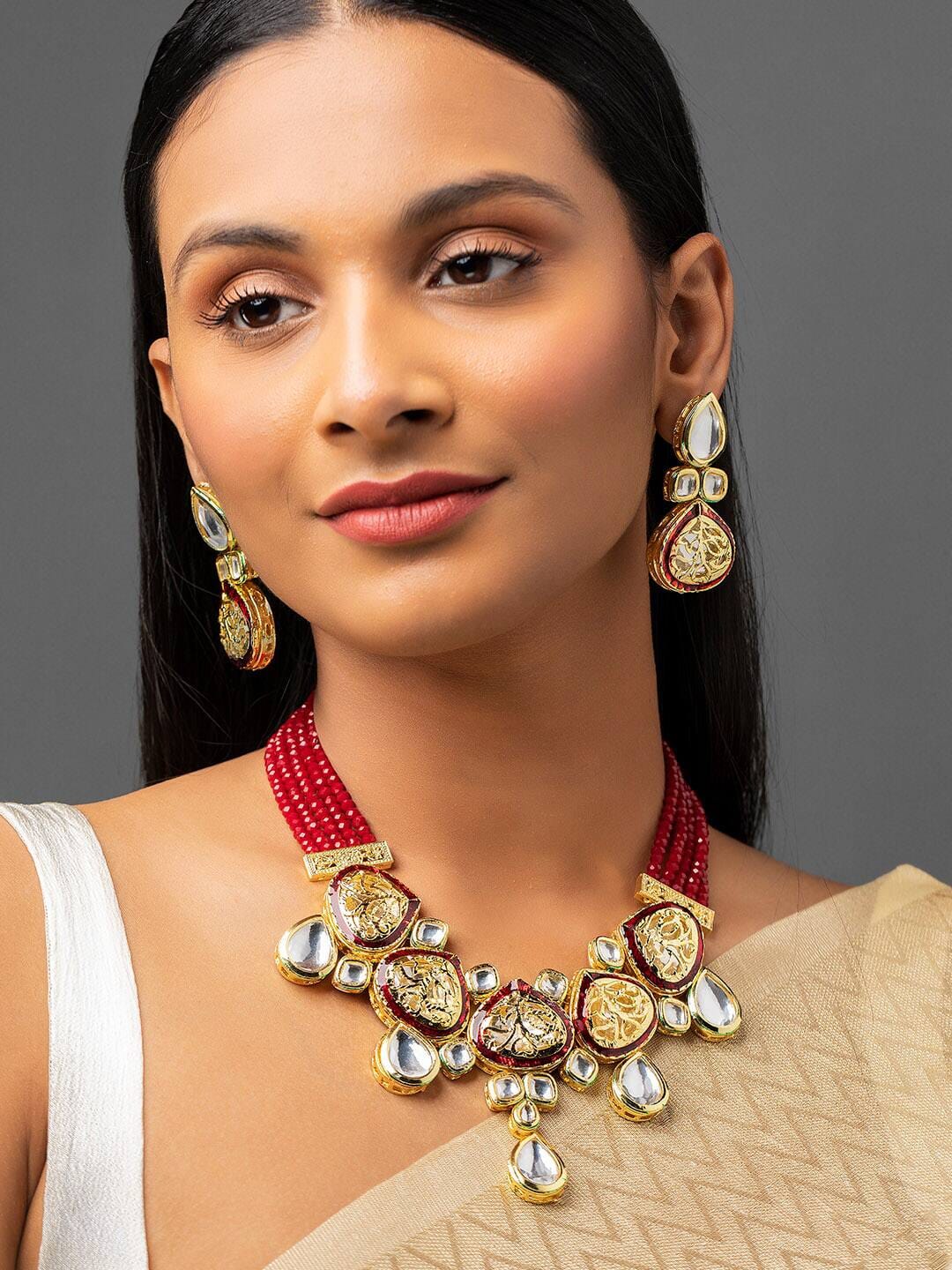 Elegant Kundan Studded Carved Multilayer Gold Plated Jewellery Set