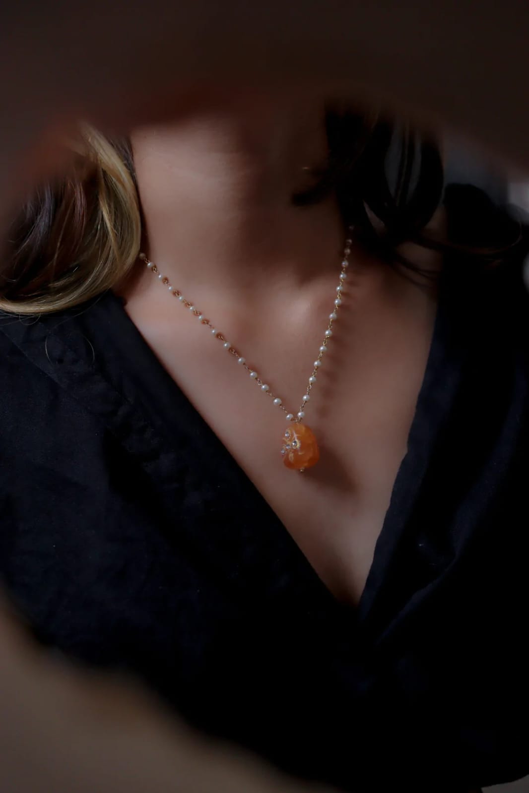 Fine White Pearls Necklace With Orange Middle Stone
