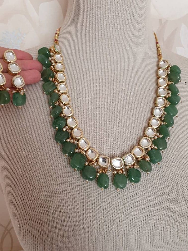 Elegant Kundan Necklace With Earrings