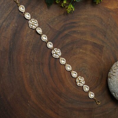 Gold Kundan Embellished Floral Unit Headband Mathhapatti