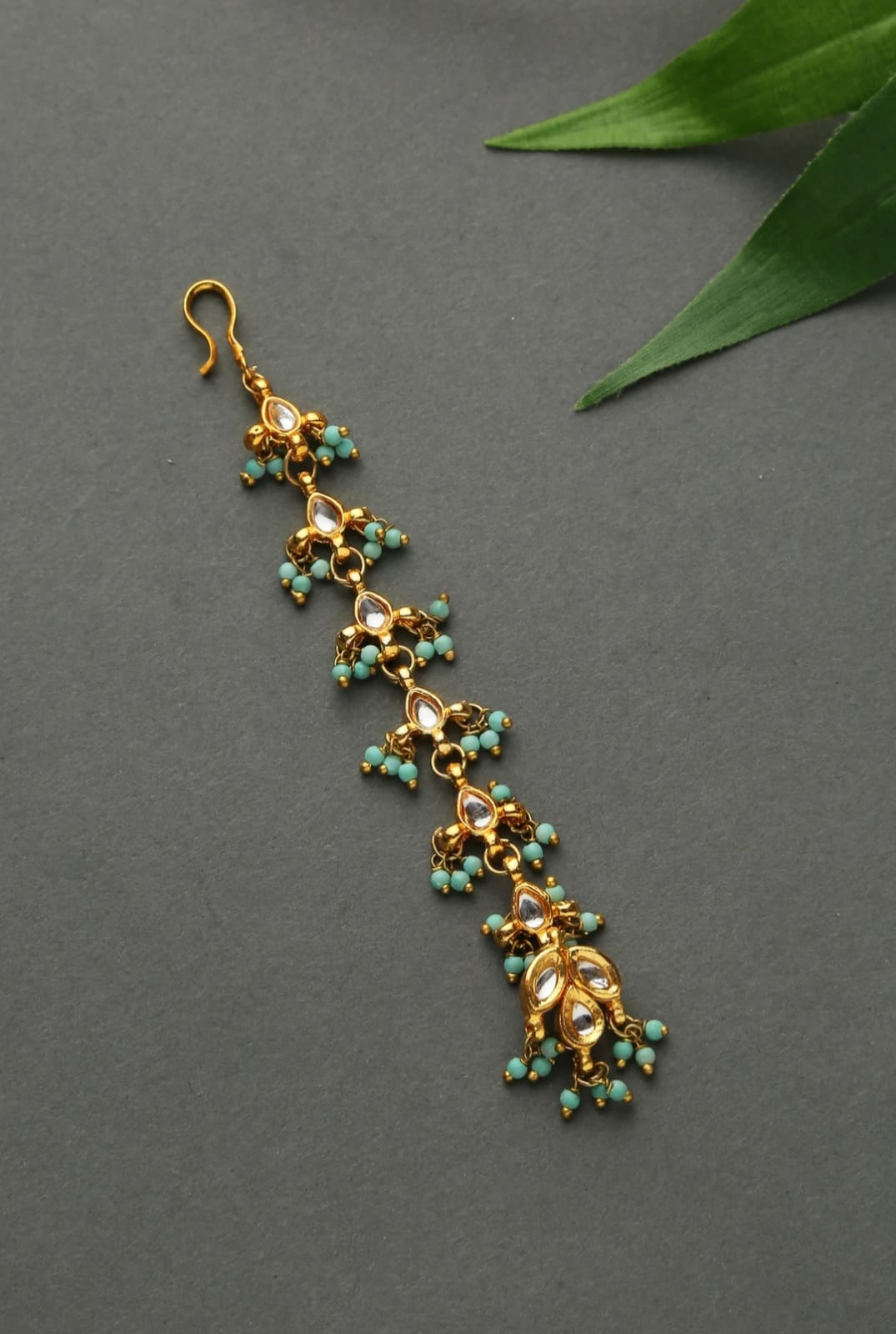 Gold Finish Kundan & Shell Pearl Maang Tikka
