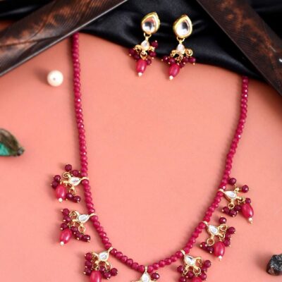 Gold-Plated Pink & White Kundan Studded & Beaded Jewellery Set