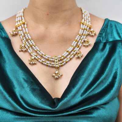 Multi-strand pearl & gold bead necklace with kundan drops
