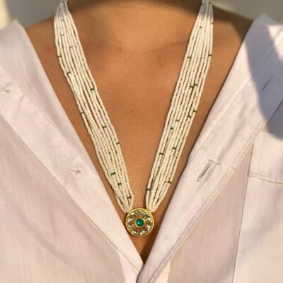 Multi-strand seed pearl necklace with round kundan pendant